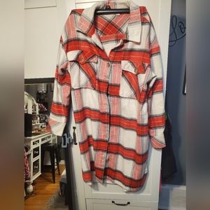 Oversized, long plaid flannel. Very warm and soft.  Great for a fall/winter look